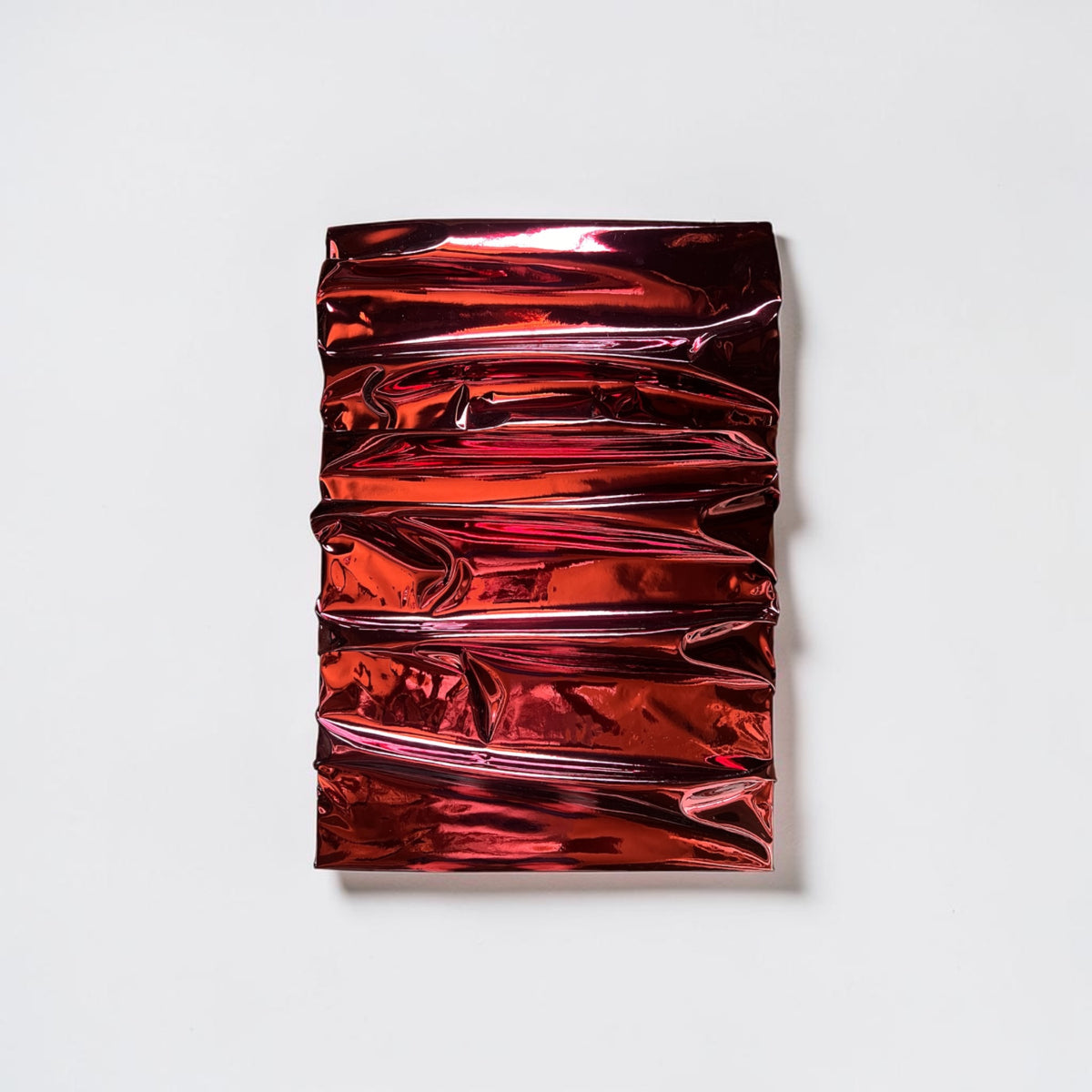 Red sculptural work by Jason Adkins